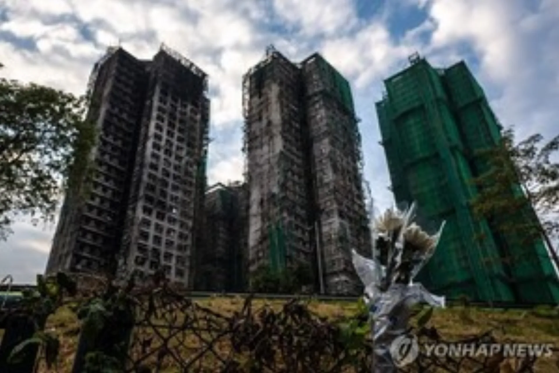 홍콩 왕푹코트 아파트 화재 참사와 보수업체 부실공사 논란